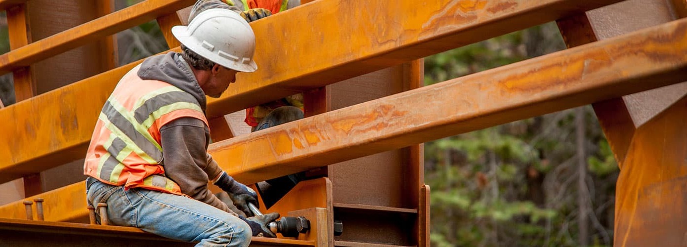 Construction worker on beam